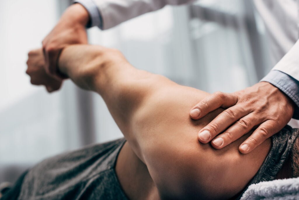 Should go see a Physiotherapist or a Chiropractor